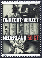 NETHERLANDS - CIRCA 1985: Dutch women in Japanese prison camp, Japnese occupation currency, building of the Burma Railway, circa 1985.