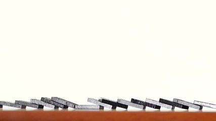 Finger falling dominoes, slow motion