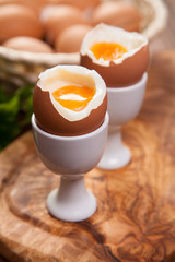 Boiled eggs on a wooden background