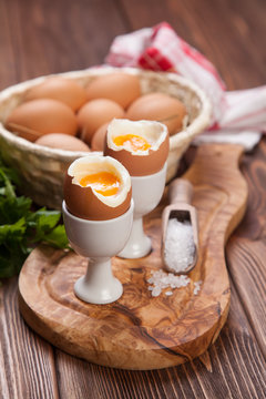 Boiled eggs on a wooden background