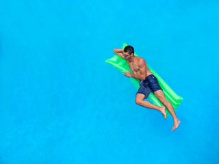 man relaxing on the air bed