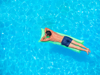 man relaxing on the air bed