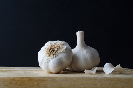 Garlic Bulb Heads on Chopping Board