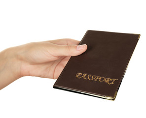 Female hand holding passport isolated on white