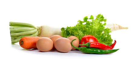 Eggs and Fresh vegetables isolated on blackground.