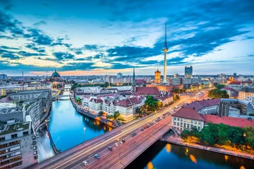 Fototapeten Berlin skyline panorama with dramatic clouds in twilight at dusk, Germany © JFL Photography