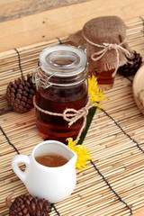 Honey variety with honeycomb and honey in a jar with beeswax.