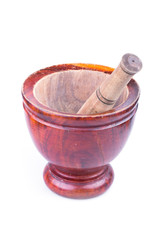 wooden mortar and pestle isolated on white background