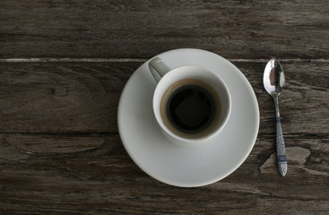 cup of coffee on wood background