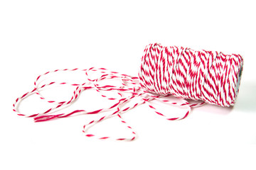 Roll of red and white thread