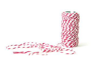 Roll of red and white thread