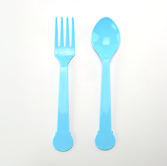 Plastic Spoon and fork on white background