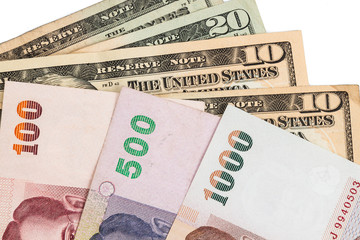 Closeup of Thai Baht and American US Dollar