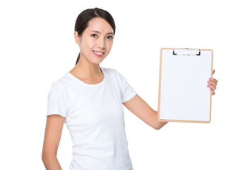 Young woman show with the white clipboard