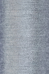 bobbin of grey thread