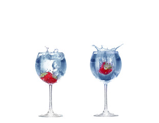 collage Strawberry splash in a cocktail glass on white