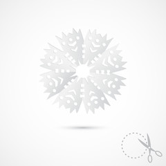 Paper snowflake on grey background. 3D Paper folding texture. Handmade.
