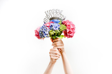 Happy Birthday Hand holding Flowers with Birthday crown
