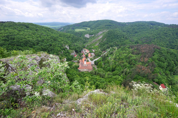 Fototapeta na wymiar Bohemian church in landscape