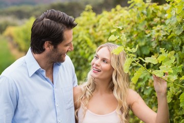 Young happy couple walking next to each other