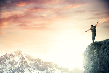 Adventurer climber reach the top of the mountain