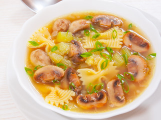 mushroom soup with pasta and vegetables