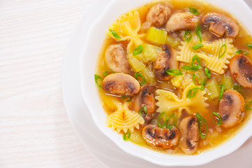 mushroom soup with pasta and vegetables