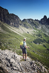 Rear view of male hiker during trekking