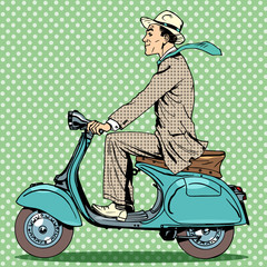 man rides on a vintage scooter © studiostoks