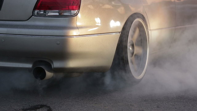 the car does drift on asphalt and burning tires, lots of smoke