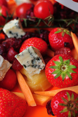 Closeup photo of a food mix(fruits,vegetables and cheese)