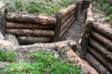 Long earthen trench dug to lay pipe.
