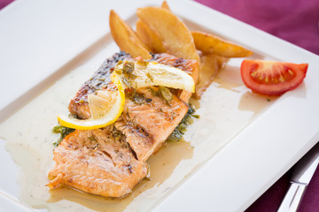 Grilled salmon in restaurant