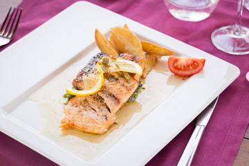 Grilled salmon in restaurant