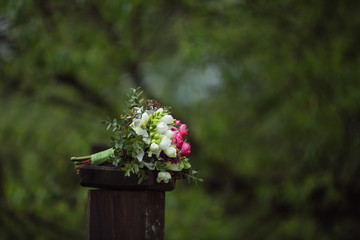 Wedding bouquet on a green background.