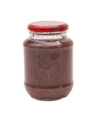 Tomato sauce jar on white background