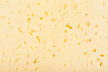 Gordijnen Fresh yellow cheese background © yurchello108