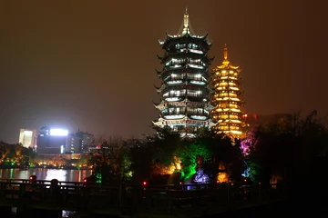 Gordijnen Gold and silver pagodas, Guilin, China © aquatarkus