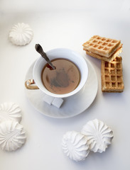 Tea with waffles and marshmallows