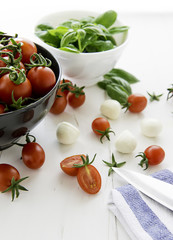 cherry tomatoes with green basil