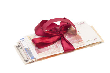 Gift of money isolated on white