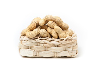 peanuts isolated in basket on white background