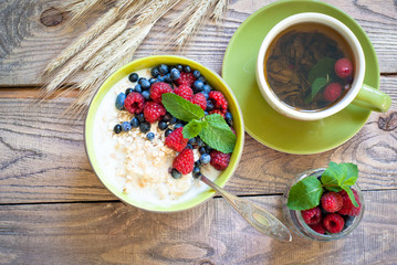 Healthy breakfast - oatmeal with berries