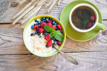 Healthy breakfast - oatmeal with berries