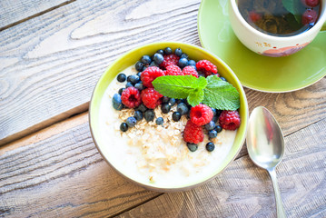 Healthy breakfast - oatmeal with berries