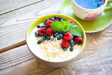 Healthy breakfast - oatmeal with berries