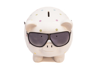 Piggy bank with sunglasses