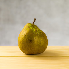 pears on wood table