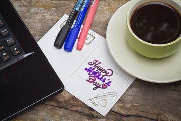 Mother's Day card written on an old wooden concept of Mother's Day.