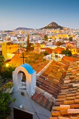 Gordijnen View of Lycabettus hill and a small Greek orthodox church in Anafiotika, Athens. © milangonda